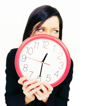 Women Holding Clock Photo